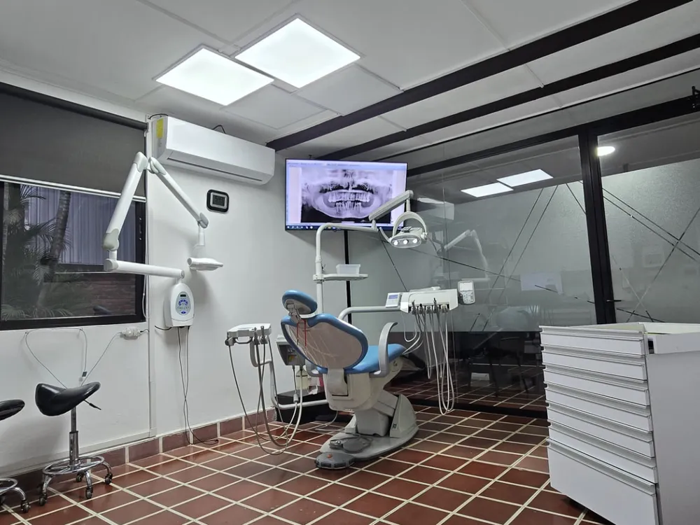 Dental One operatory with X-ray unit and panoramic radiograph on screen